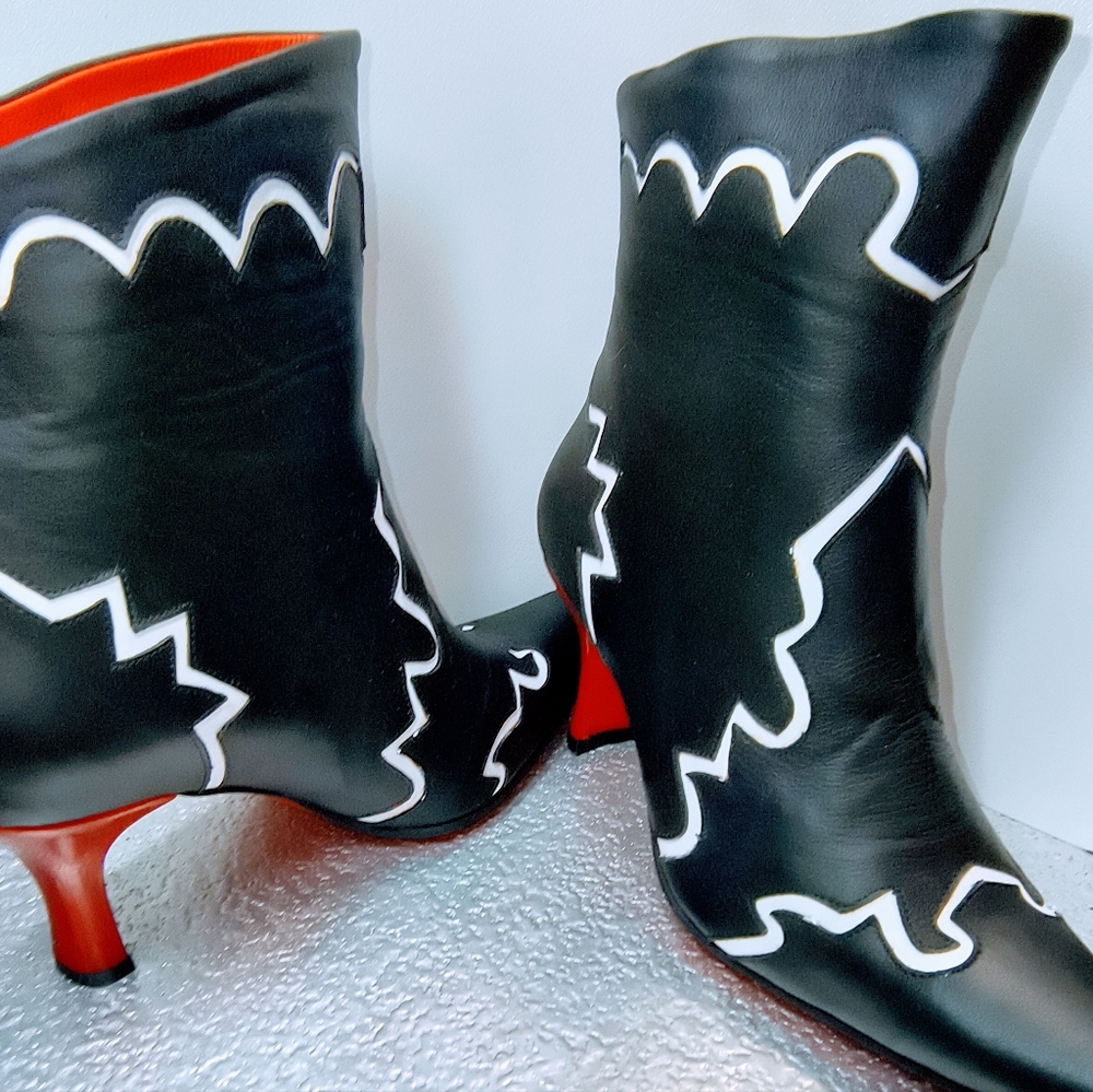 ROCKWELL THARP Vibrant Black & White Heeled Boots with Glossy Red Accents